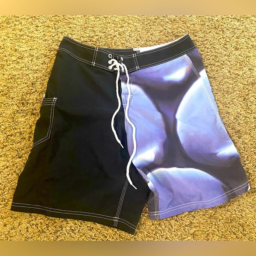 Men’s Swim Trunks 21” across waist and 20” in length.